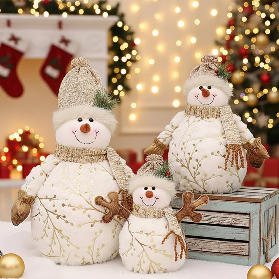 Three decorative snowmen with a Christmas tree and stockings in the background