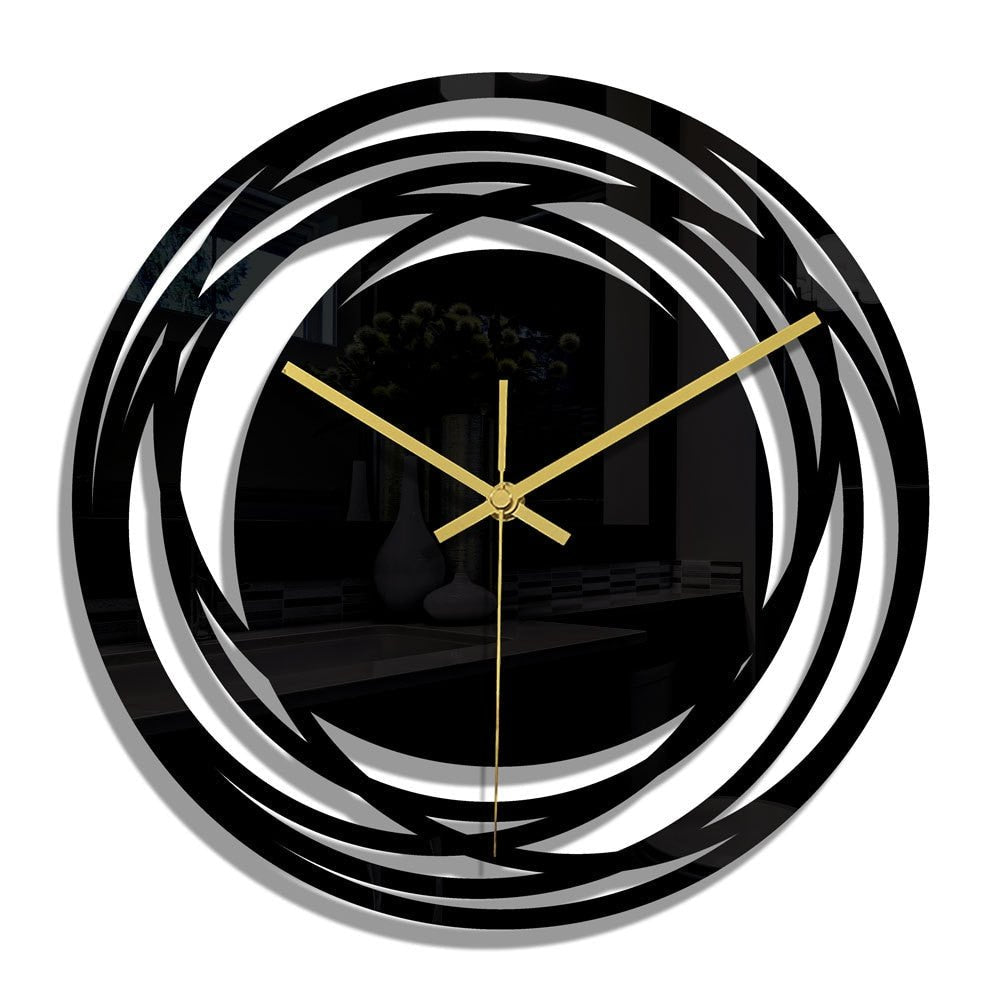Modern wall clock with black and silver spiral design on a white background